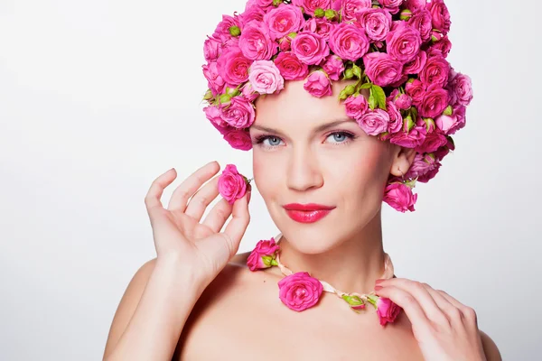 Girl with flower hairstyle Royalty Free Stock Photos