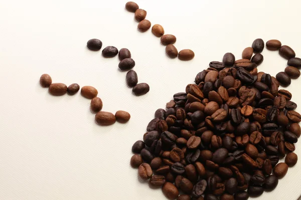 Granos de café formando taza de café — Foto de Stock