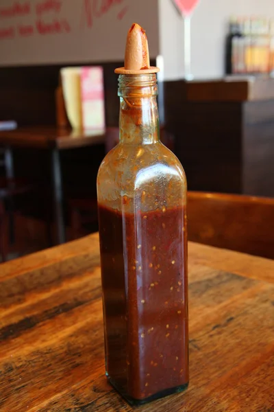 Bouteille de sauce aromatisée — Photo