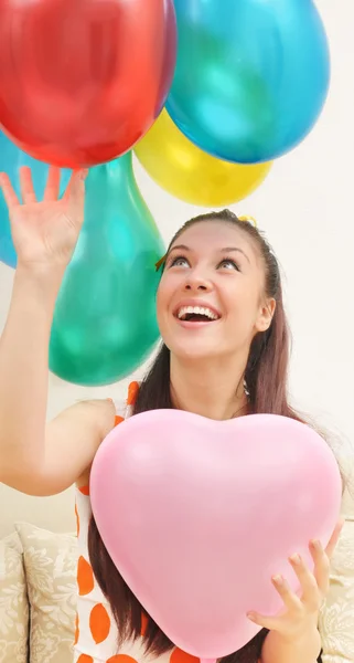 Girl and balloons — Stock Photo, Image