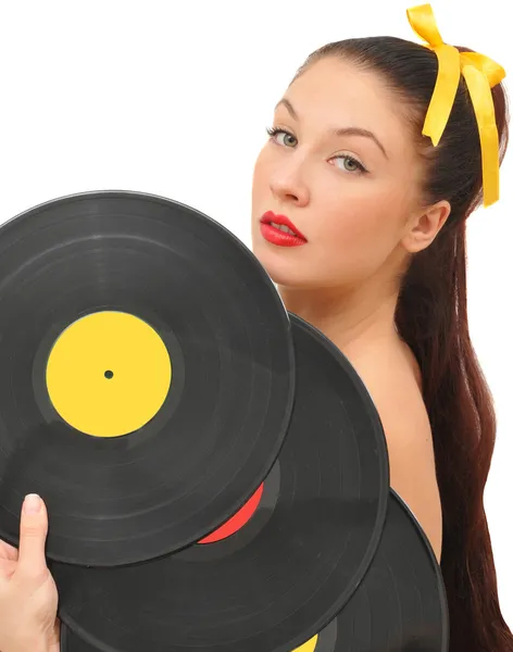 Nice young woman vinyl disks look at camera — Stock Photo, Image