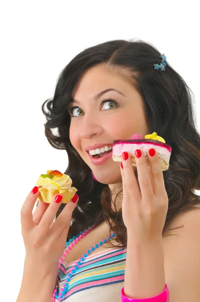 Nette junge Frau mit zwei leckeren Kuchen — Stockfoto