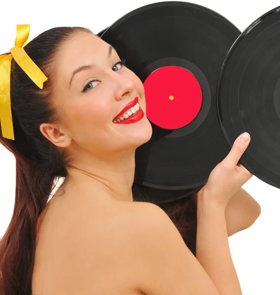 Красавица улыбающаяся молодая женщина с виниловыми дисками — стоковое фото