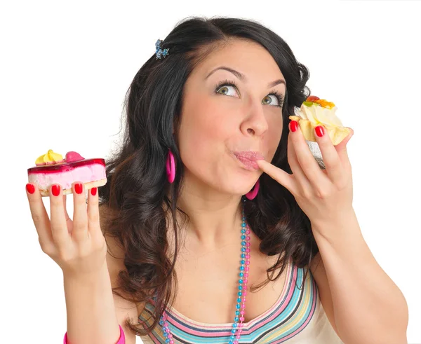 Nice young woman with two tasty cakes — Stock Photo, Image