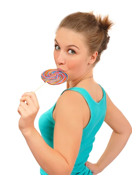 Pretty young woman with candy in her hand — Stock Photo, Image