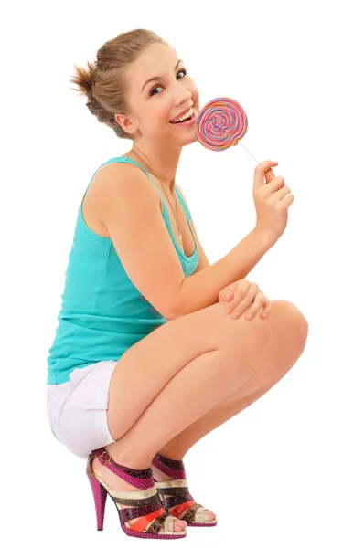 Pretty happy woman with lollipop — Stock Photo, Image