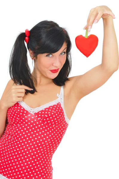 stock image Beauty girl with red heart-shaped pepper