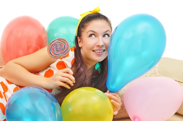 Ładny dziewczyna wśród balonów — Zdjęcie stockowe