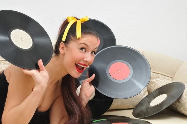 Girl music lover with vinyl discs — Stock Photo, Image