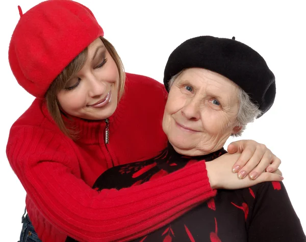 Granddaughter look at happy grandmother — Stock Photo, Image