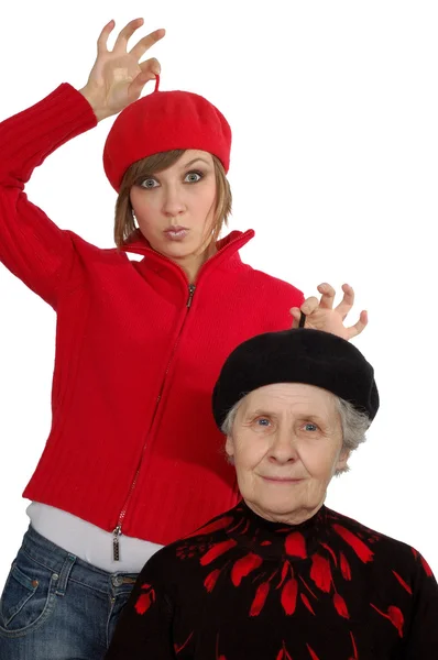 Feliz abuela y nieta con boinas — Foto de Stock