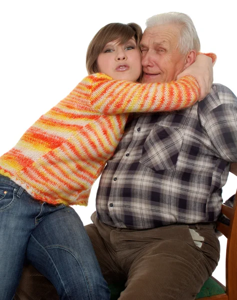 Happy grandchild hugs a happy grandad — Stock Photo, Image