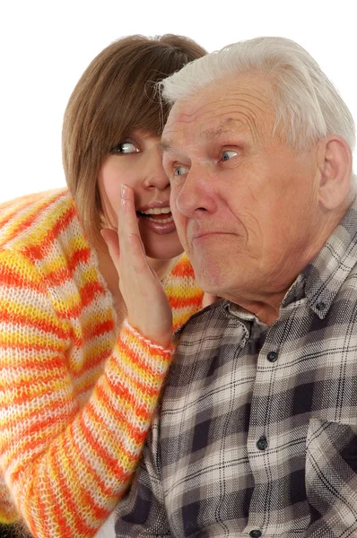 Дедушка и внучка сплетничают — стоковое фото