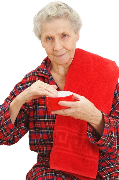 Senior lady with cream — Stock Photo, Image