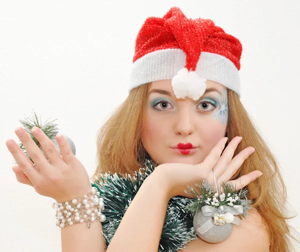 Nice girl with christmas toys — Stock Photo, Image