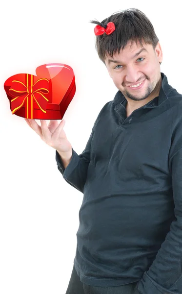 Funny man with gift in hand — Stock Photo, Image