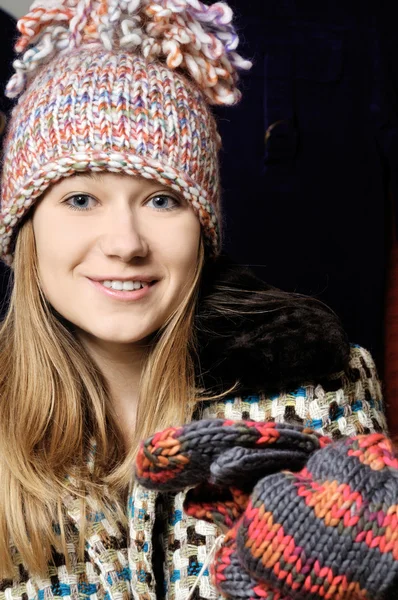 Beautiful young girl in winter hat and mittens — Stock Photo, Image