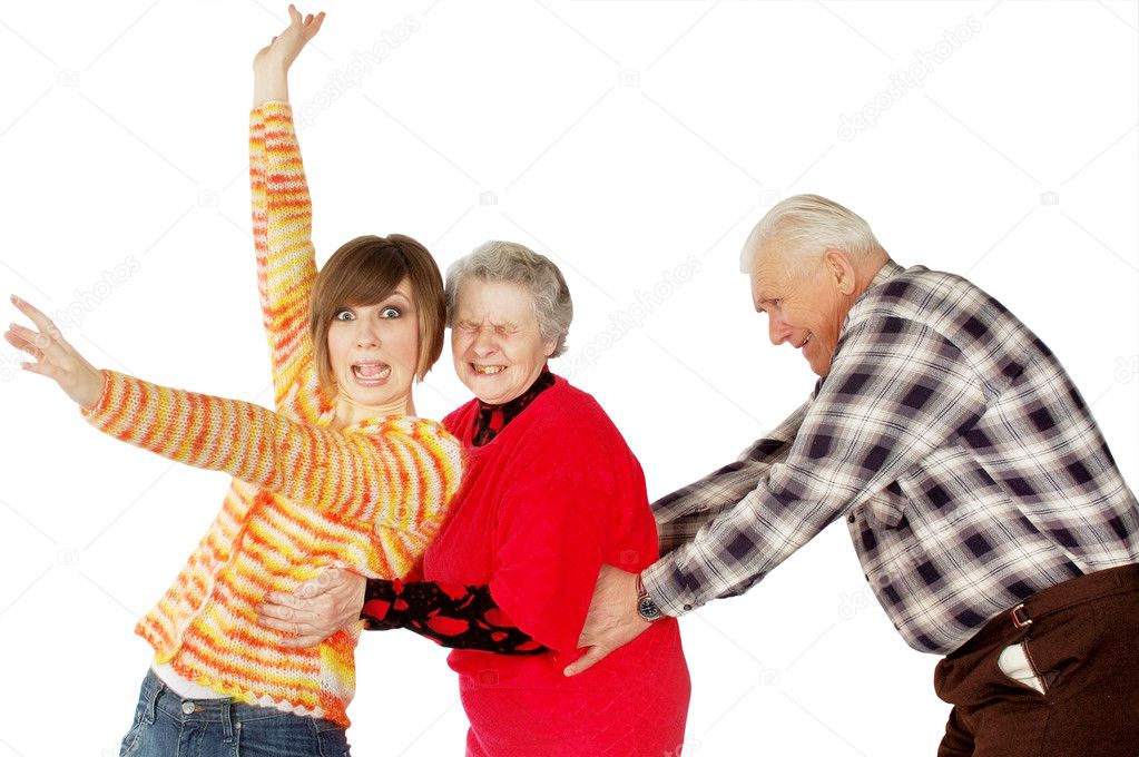 Happy grandparents and granddaughter play fool