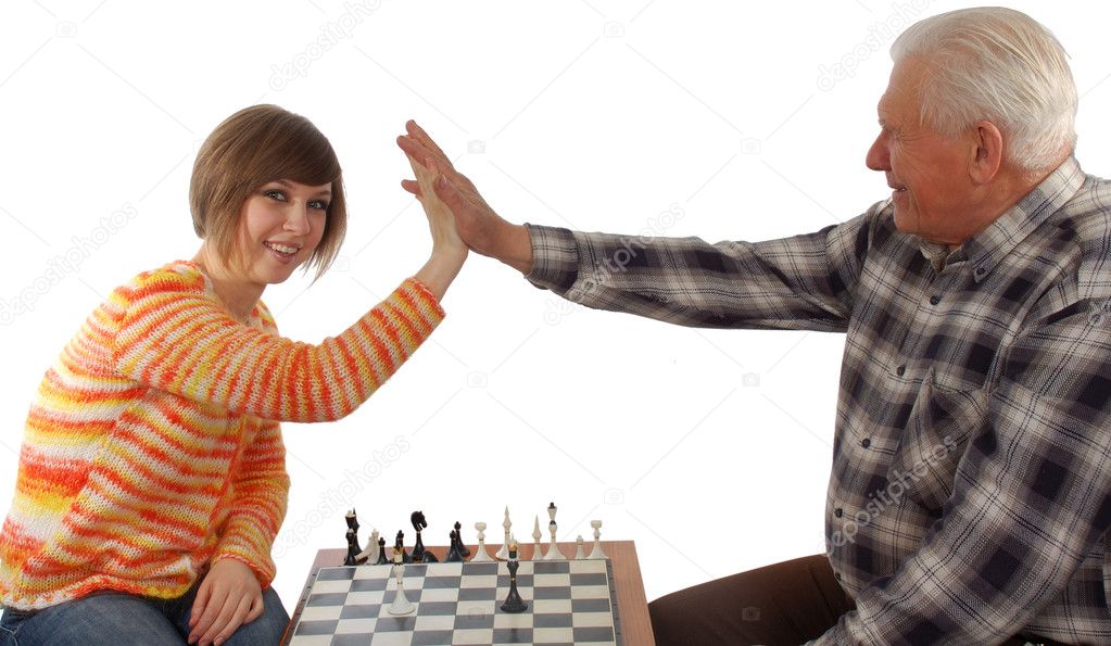 Grandad and granddaughter make a compromise in chess game