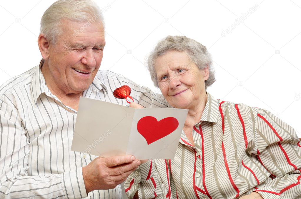 Happy old couple with post-card