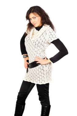 Beautiful young posing girl dressed in duotone and white knitted clipart