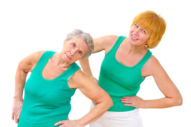 Two smiling women doing gymnastics clipart