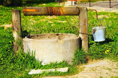 Village well in summer clipart