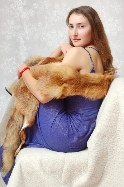 Nice girl with fox on shoulders — Stock Photo, Image