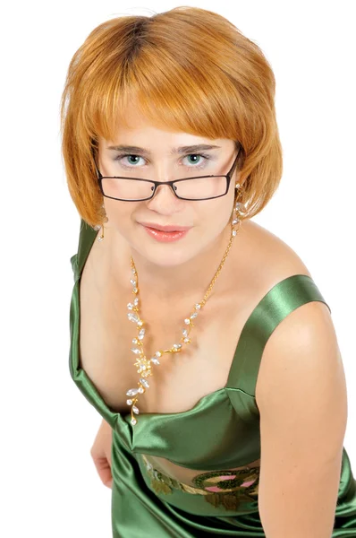 Porträt einer heißen Frau in leuchtend grünem Kleid — Stockfoto