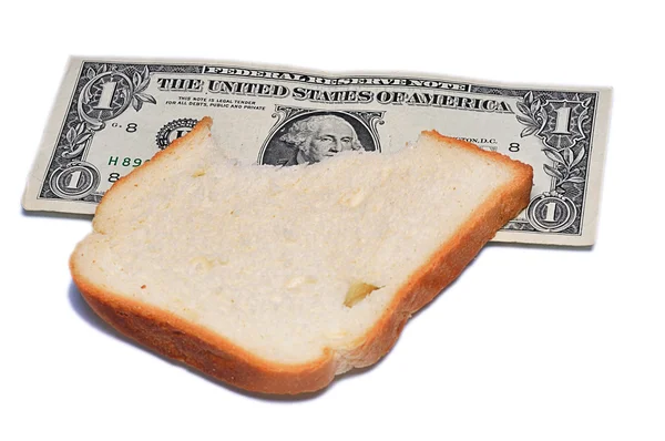 Jeden dolar poblíž chléb — Stock fotografie