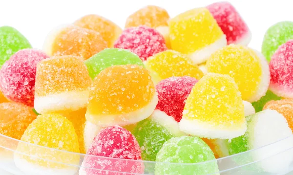 Pila de caramelos de frutas en el fondo — Foto de Stock