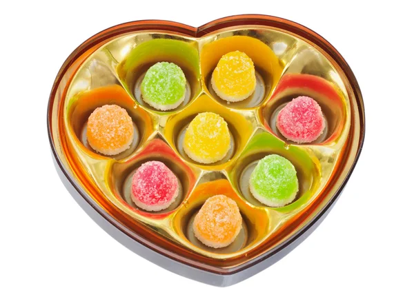 Kalp içinde birkaç lezzetli meyve şekeri — Stok fotoğraf