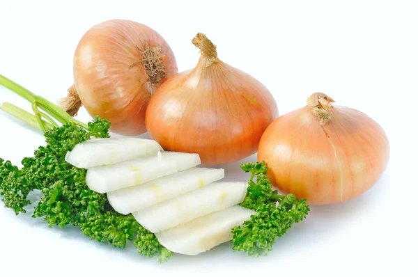 Three onions with parsley — Stock Photo, Image