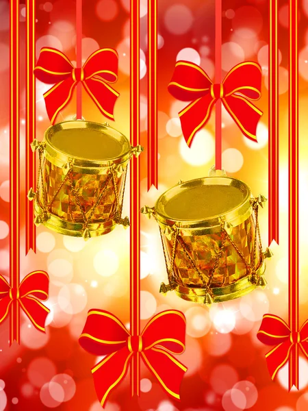 Два золотых барабана и красные луки — стоковое фото