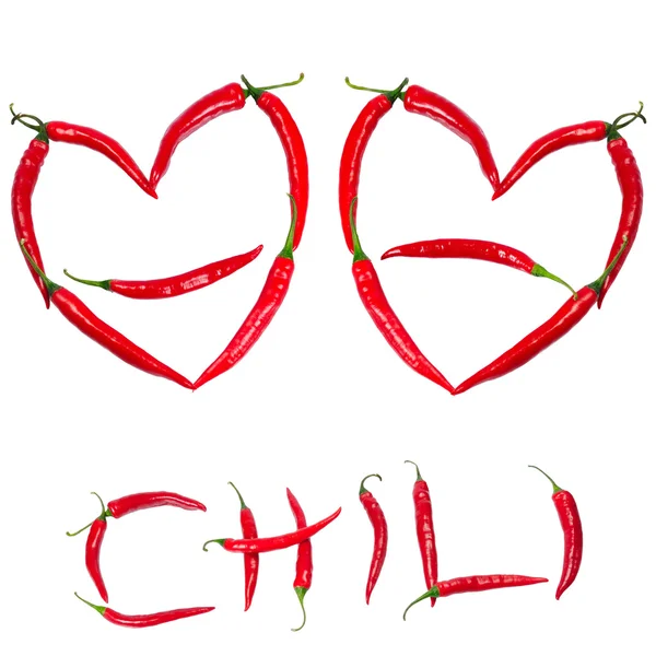 Chilipepertjes die vormen van hart — Stockfoto