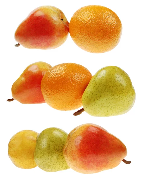 Pêras coloridas e laranjas — Fotografia de Stock