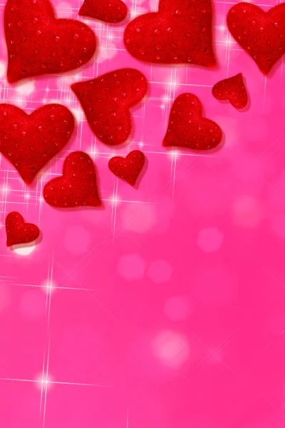Hjärtan på rosa bakgrund — Stockfoto