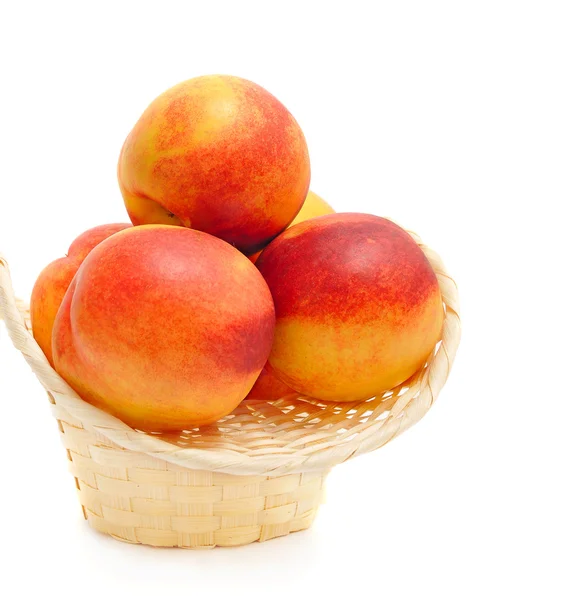 Nectarines in basket — Stock Photo, Image