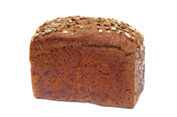 Ruddy lång limpa bröd med solrosfrön — Stockfoto