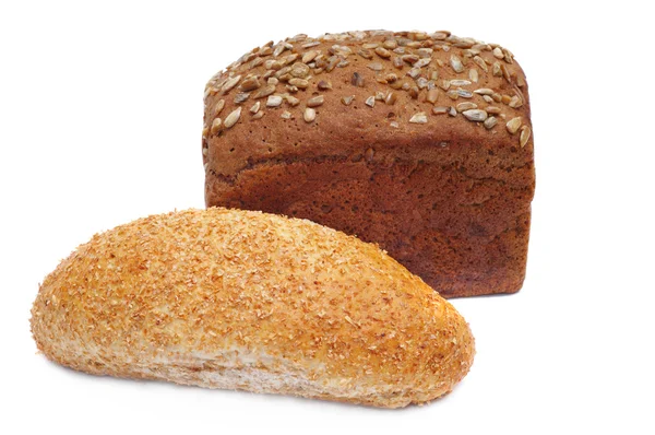 Two ruddy loafs of bread with sunflower seeds — Stock Photo, Image