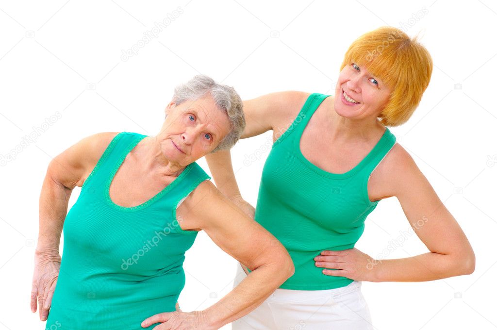 Two smiling women doing gymnastics