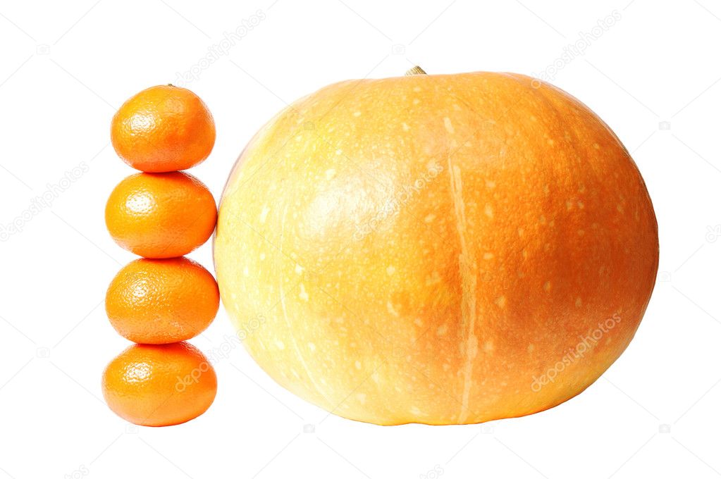 Mandarins and pumpkin side by side