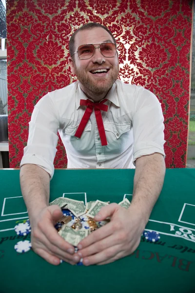Smiling Man Wins Big at Blackjack — Stock Photo, Image