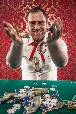 Smiling Man Wins Big Money at Blackjack clipart