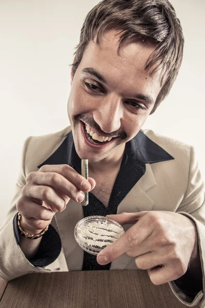 Brunette young white mustached drug user doing cocaine — Stock Photo, Image