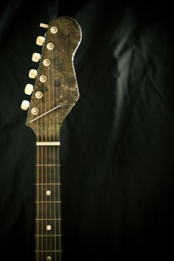 Neck and frets of a guitar clipart