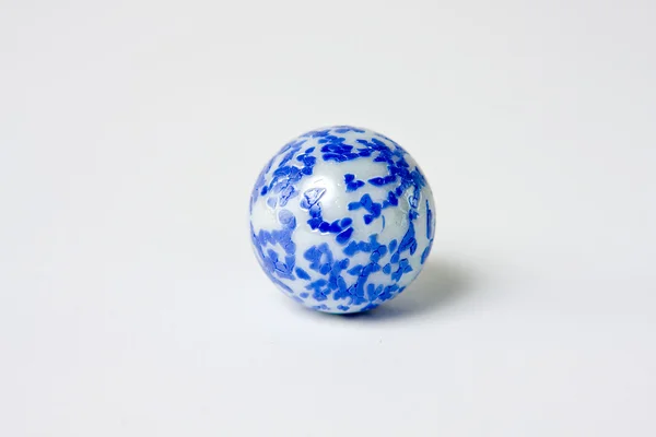 stock image Blue and white speckled glass marble