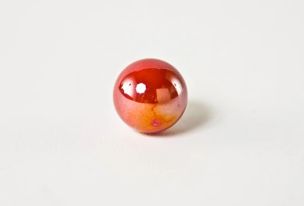 stock image Red and orange glass marble