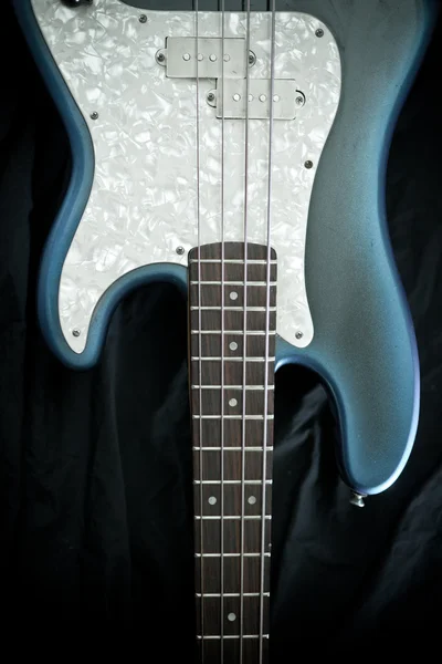 Blue and ivory bass guitar — Stock Photo, Image