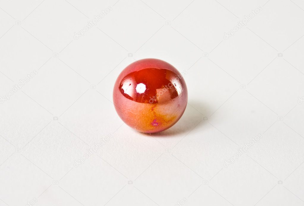 Red and orange glass marble